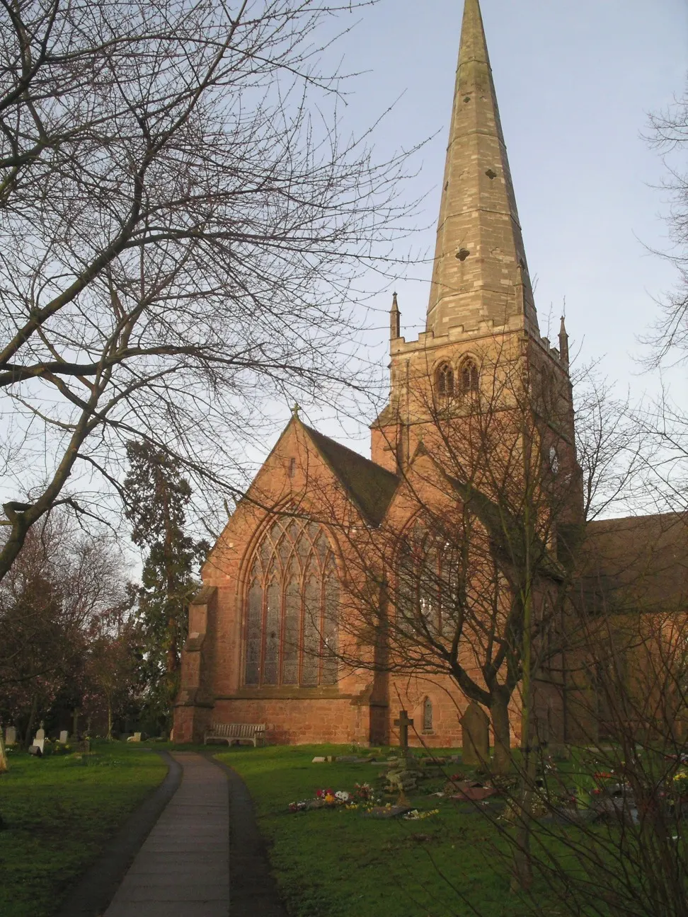 The spire of St Alphege Church above the rooftops of Solihull town centre