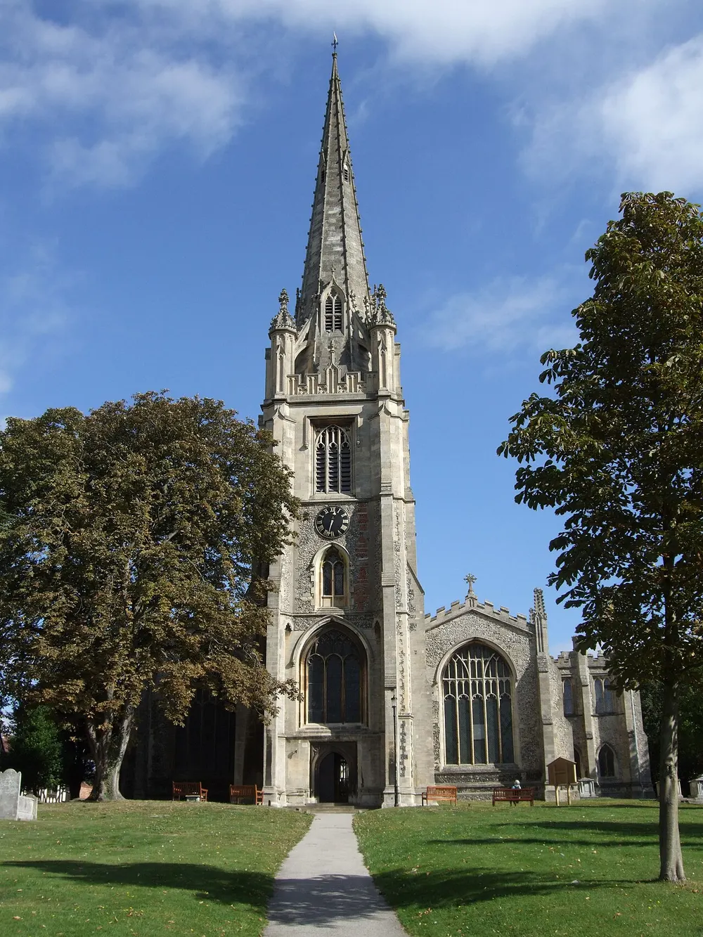 The tall spire of St Mary the Virgin rising over the old rooftops of Saffron Walden