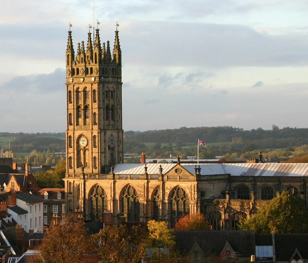 The tall tower of St Mary's church rising above the centre of Warwick