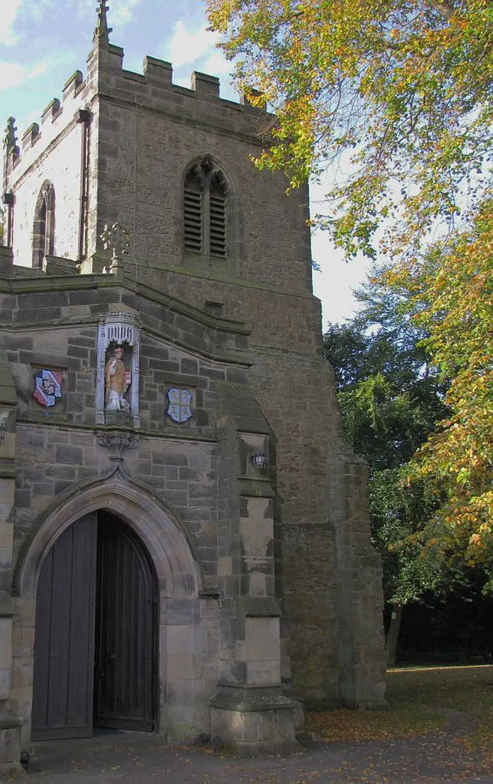 The stone tower of St Giles' Church above Gilesgate in Durham