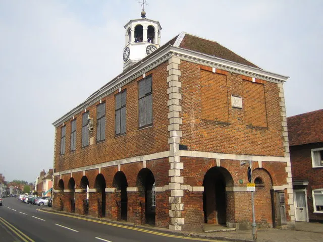 The brick Market Hall standing on its open arched ground floor in Old Amersham High Street