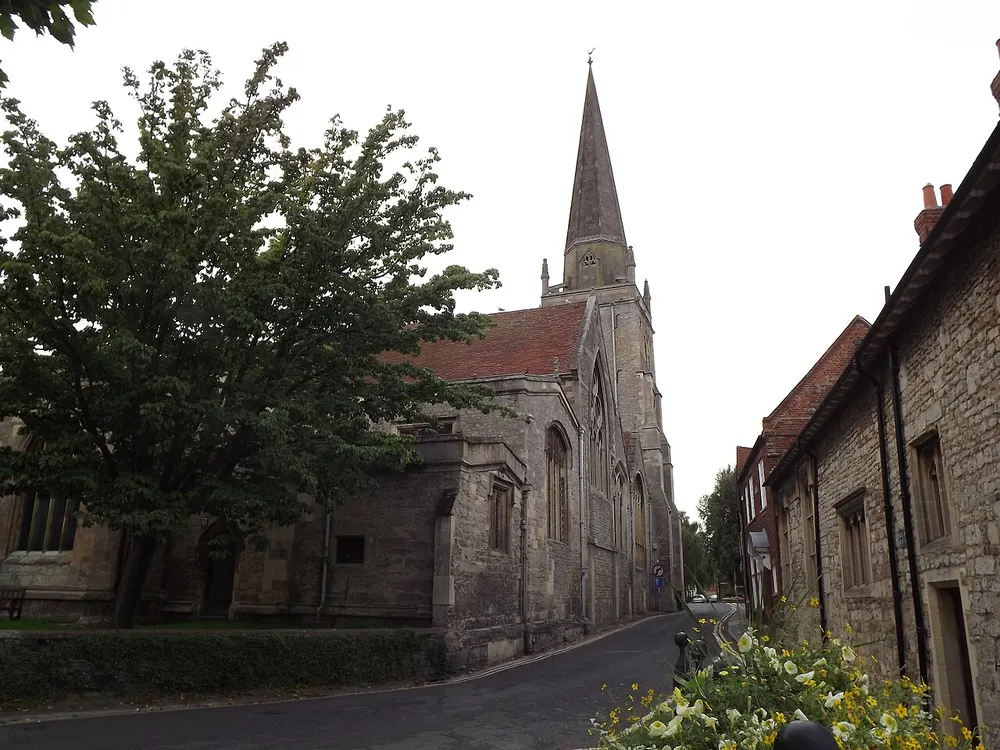 The spire of St Helen's Church rising above the rooftops and river at Abingdon