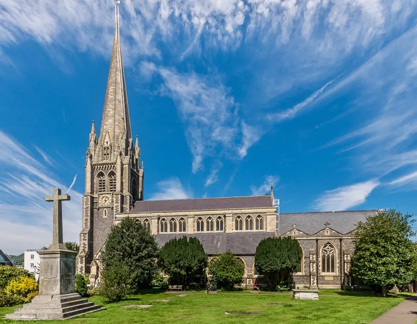 The tall spire of St Martin's Church rising above the rooftops of Dorking